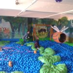 Giant ball pool with wall painting and play equipment