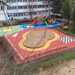Playground ship, swings, sandpit, pour-in-place rubber playground surfacing
