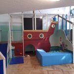 Wooden play structure for indoor playgrounds